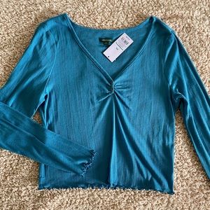 Slightly see through blue crop top!